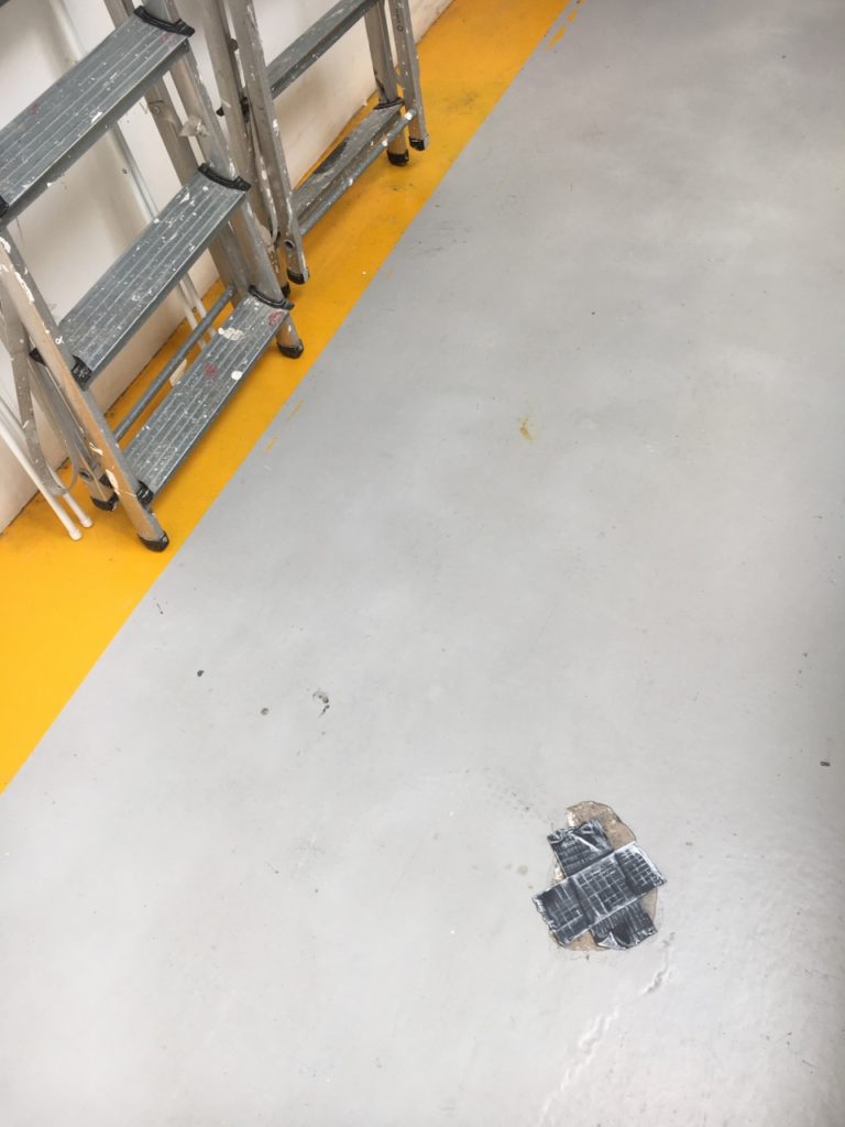 Patching up the studio floor