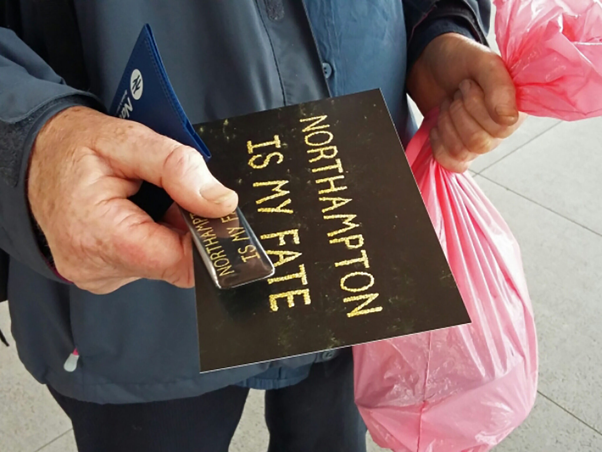 Distributing Postcards and Badges by Sayed Sattar Hasan